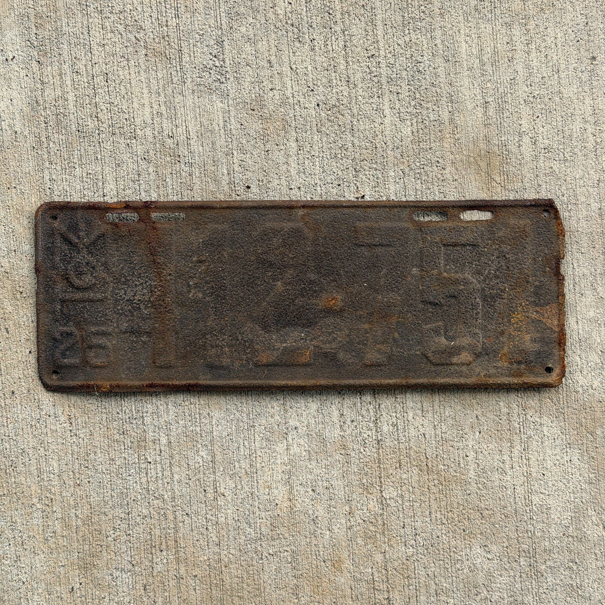 Photo of a 1925 Michigan License Plate Auto Tag Garage Decor Vintage 412 751 with original patina