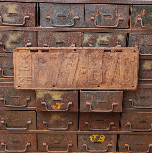 Photo of a 1925 Michigan License Plate Auto Tag Garage Decor Vintage 677 876 with original patina