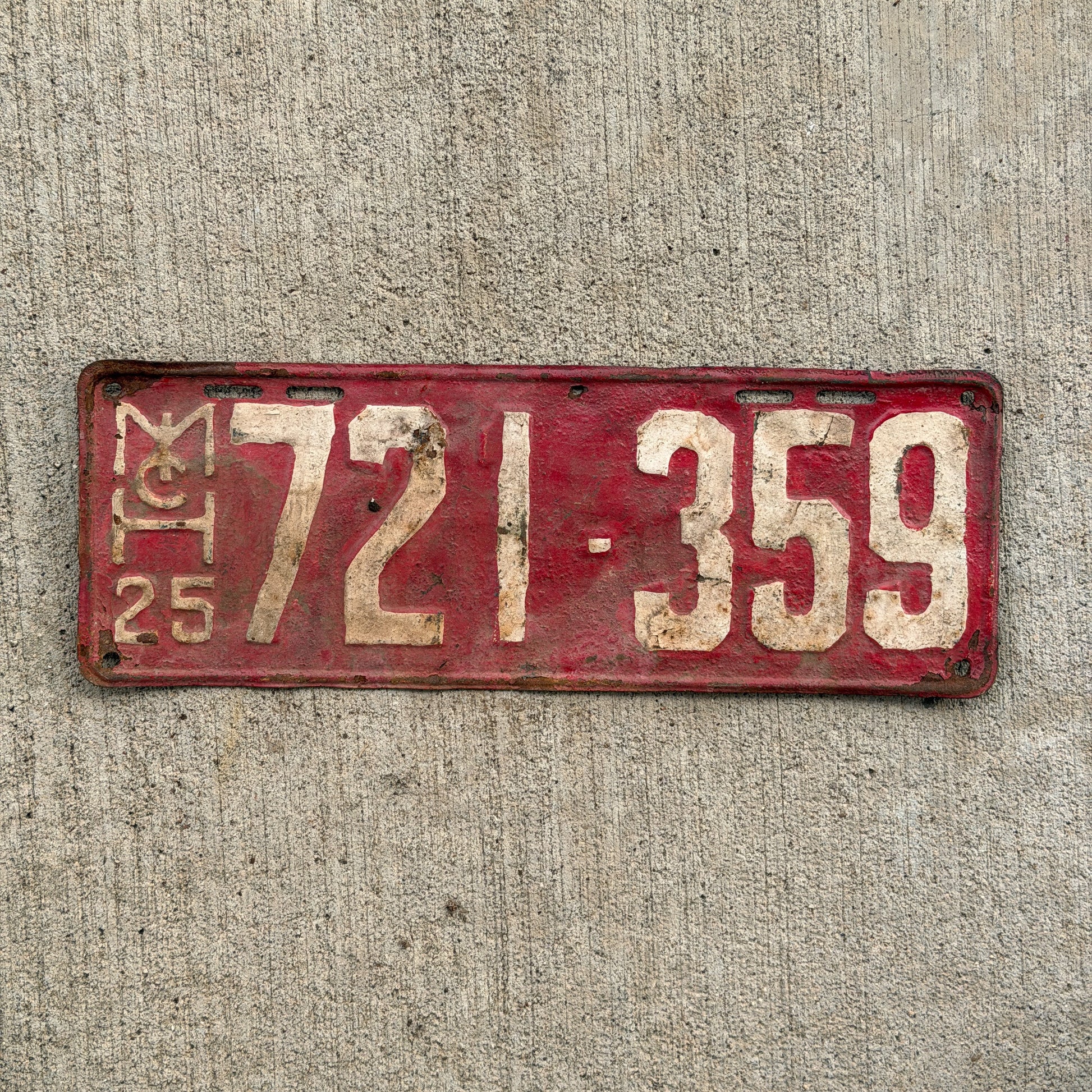Photo of a 1925 Michigan License Plate Auto Tag Garage Decor Vintage 721 359 with original patina