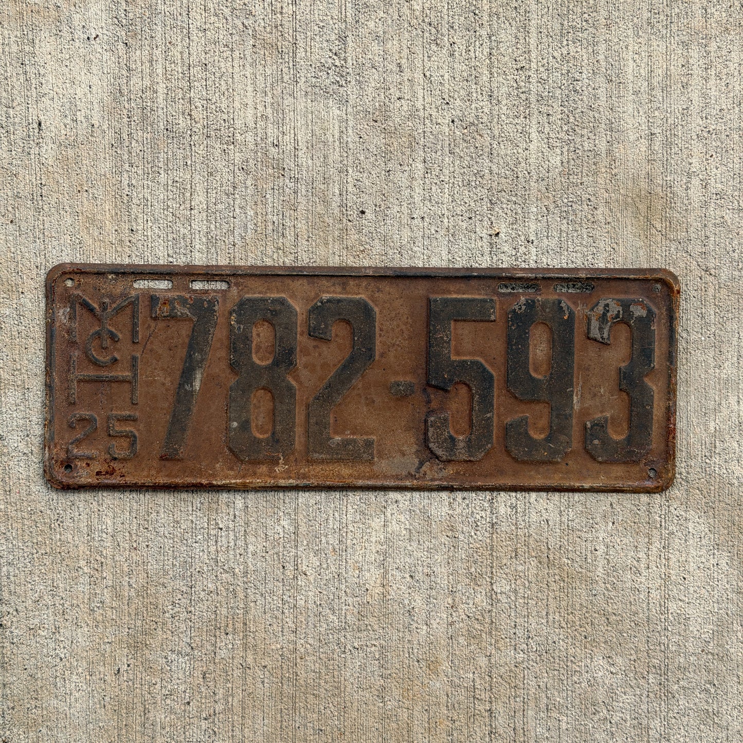Photo of a 1925 Michigan License Plate Auto Tag Garage Decor Vintage 782 593 with original patina