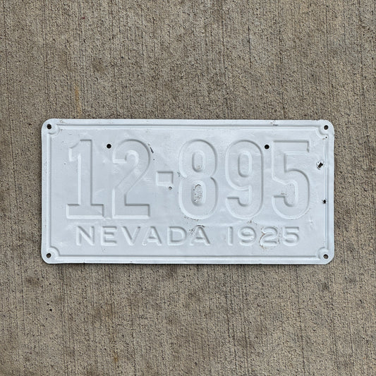 Photo of a 1925 Nevada License Plate Auto Tag Garage Decor Vintage Debossed 12 895 with original patina
