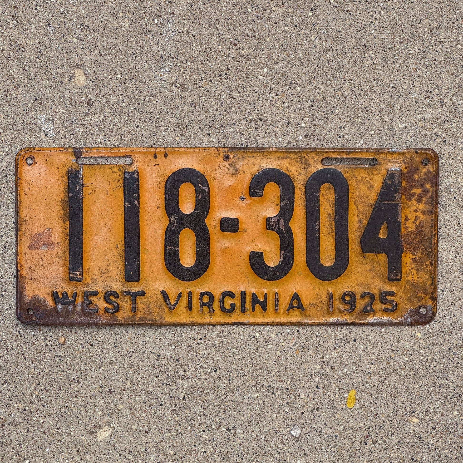 Photo of a 1925 West Virginia License Plate Auto Tag Garage Decor Vintage 118 304 with original patina