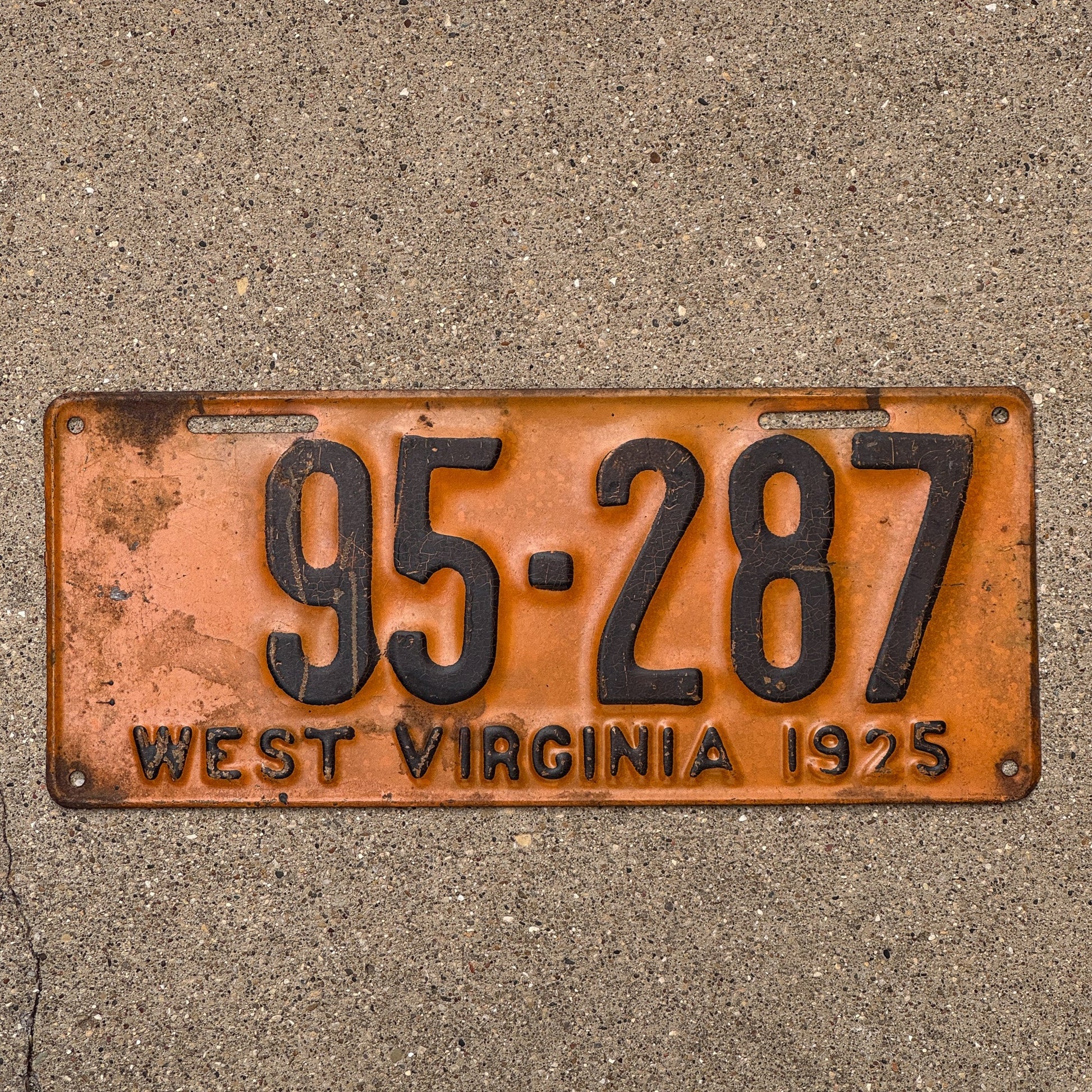 Photo of a 1925 West Virginia License Plate Auto Tag Garage Decor Vintage 95 287 with original patina