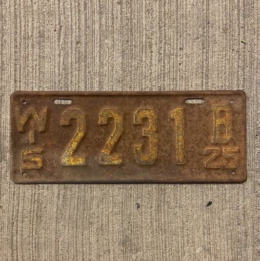 Photo of a 1925 Wisconsin License Plate Auto Tag Garage Decor Vintage Four Digit Low Number 2231 with original patina