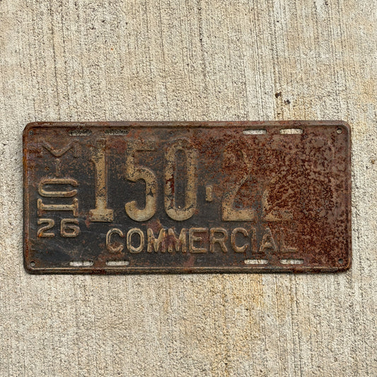 Photo of a 1926 Michigan Commercial License Plate Auto Tag Garage Decor Vintage 150 228 with original patina