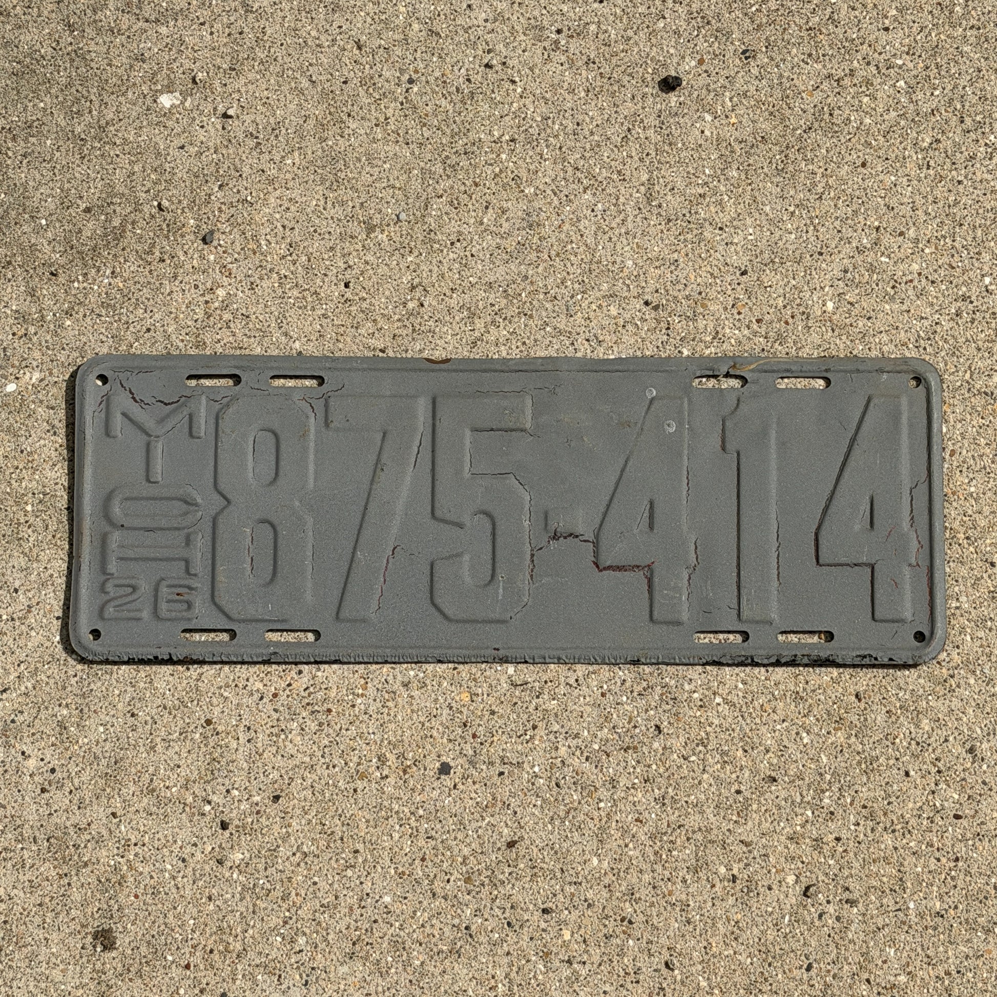 Photo of a 1926 Michigan License Plate Auto Tag Garage Decor Vintage 875 414 with original patina