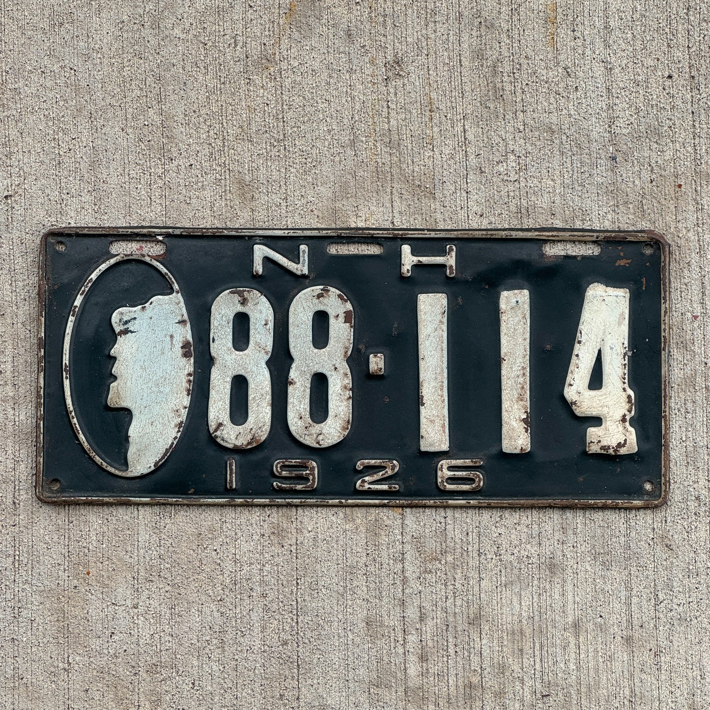Photo of a 1926 New Hampshire License Plate Auto Tag Garage Decor Vintage Old Man of the Mountain 88 114 with original patina