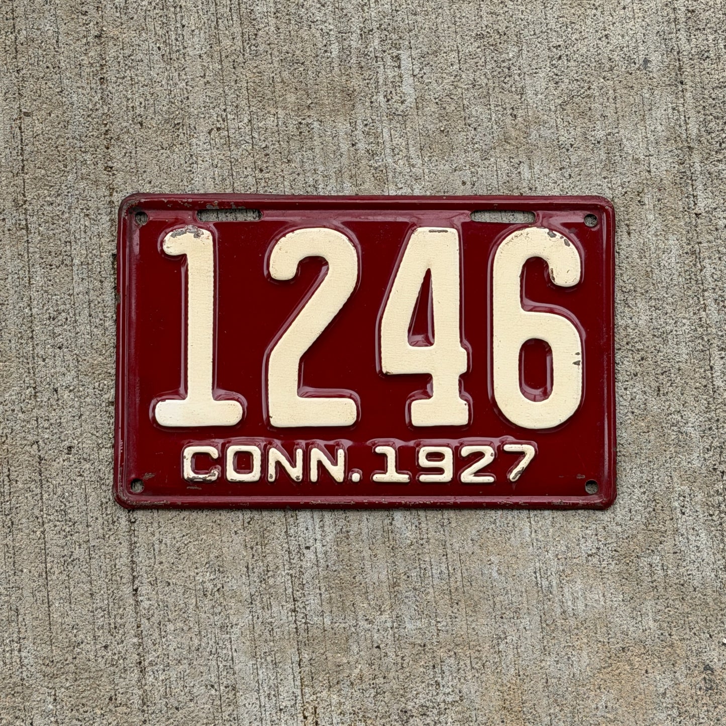 Photo of a 1927 Connecticut License Plate Auto Tag Garage Decor Vintage Low Number Four Digit 1246 with original patina