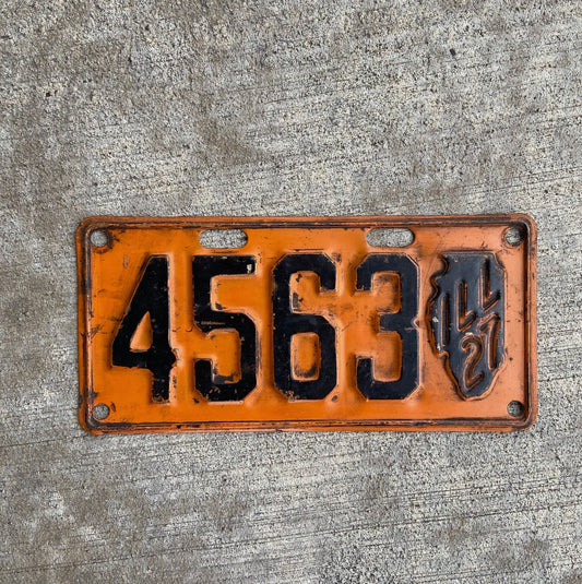 Photo of a 1927 Illinois License Plate Auto Tag Garage Decor Vintage Low Number Four Digit Iconic State Shape 4563 with original patina