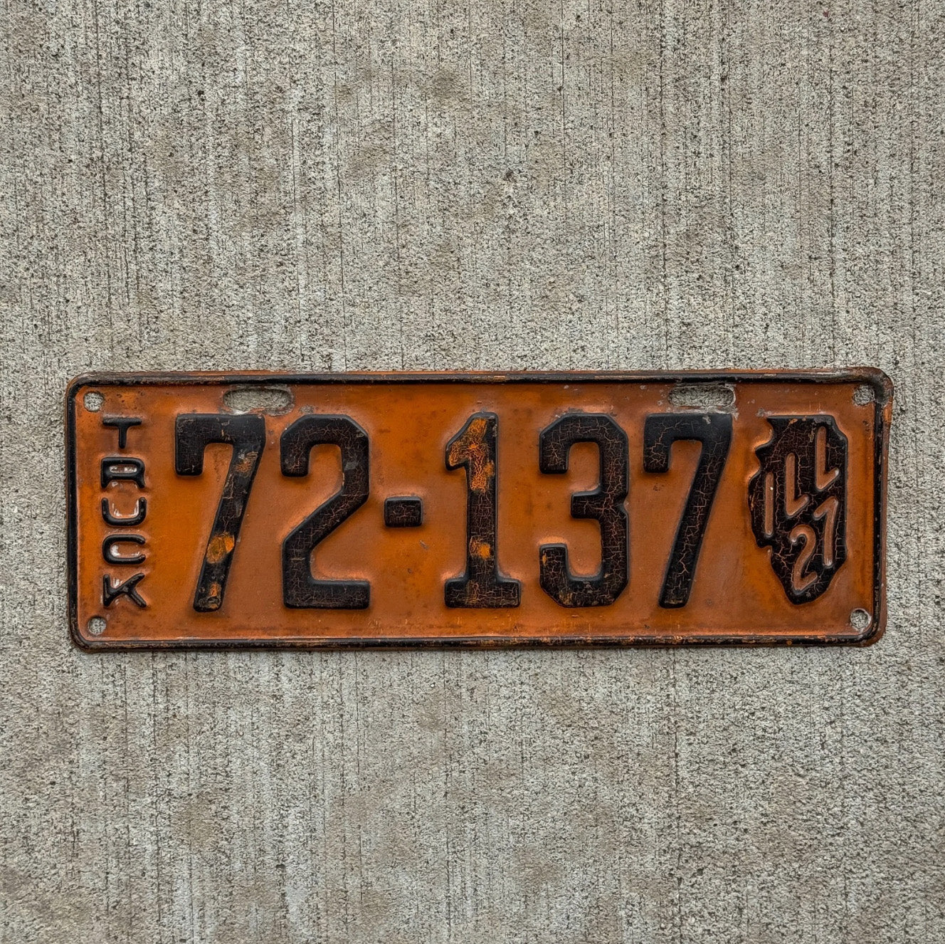 Photo of a 1927 Illinois Truck License Plate Auto Tag Garage Decor Vintage Iconic State Shape 72 137 with original patina