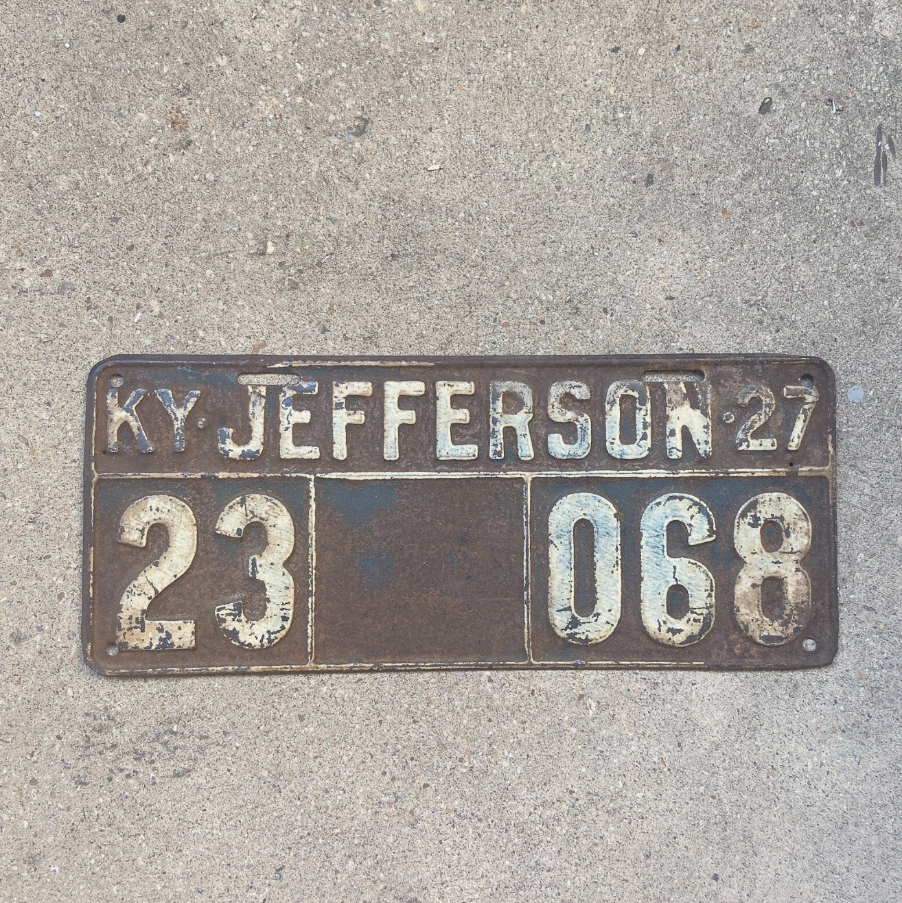Photo of a 1927 Kentucky License Plate Auto Tag Garage Decor Vintage 23 068 with original patina