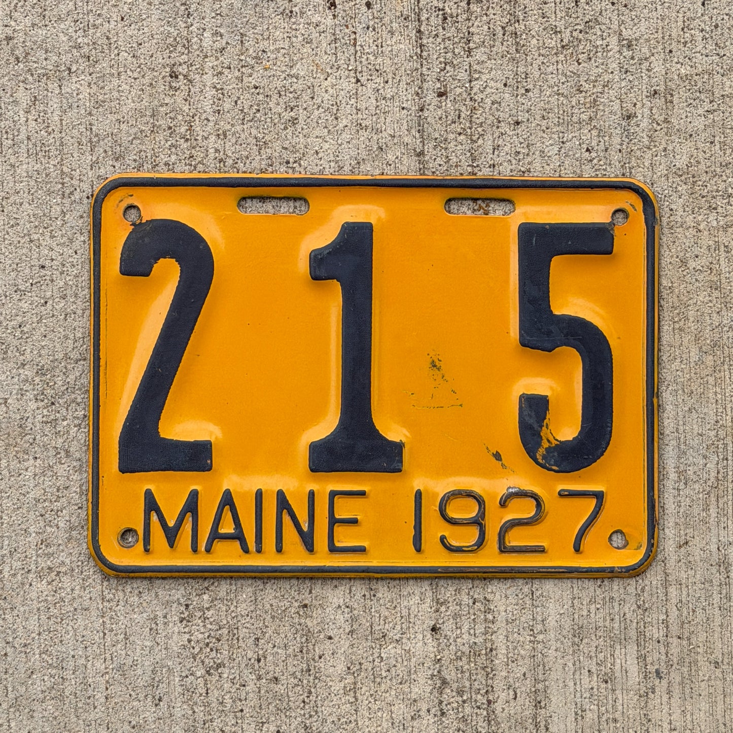 Photo of a 1927 Maine License Plate Auto Tag Garage Decor Vintage Low Number Three Digit 215 with original patina