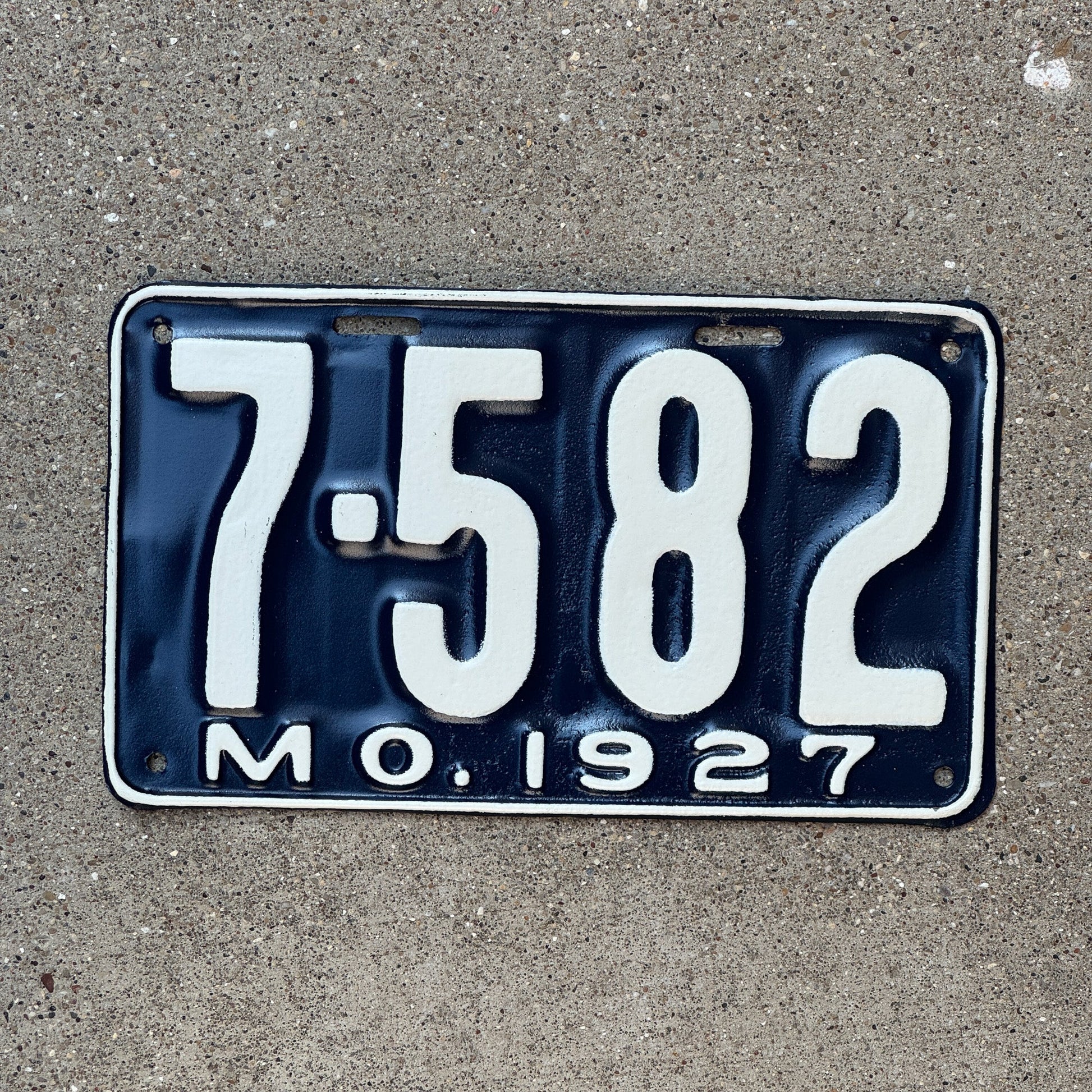 Photo of a 1927 Missouri License Plate Auto Tag Garage Decor Vintage Four Digit 7582