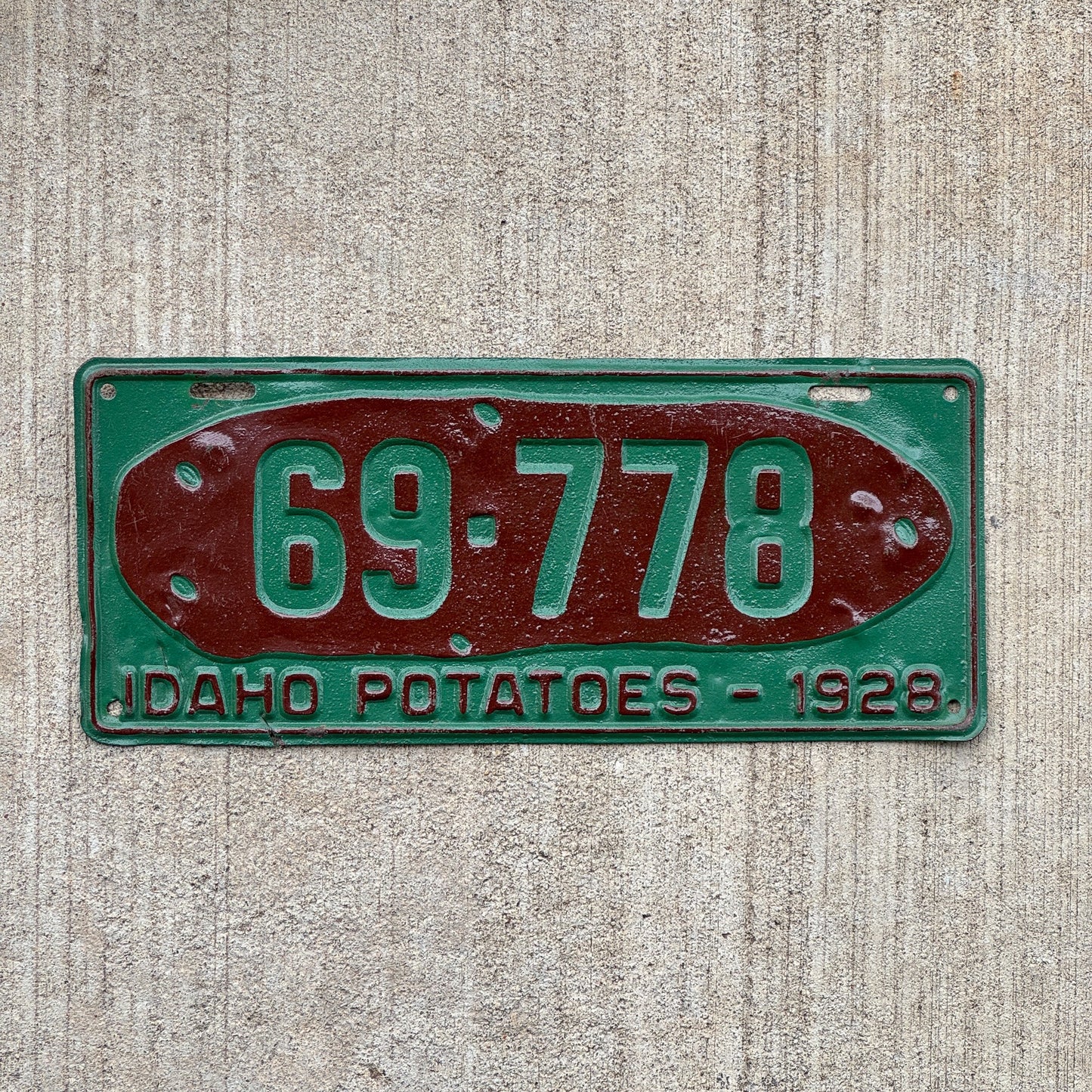 Photo of a 1928 Idaho License Plate Auto Tag Garage Decor Vintage Iconic Potato 69 778