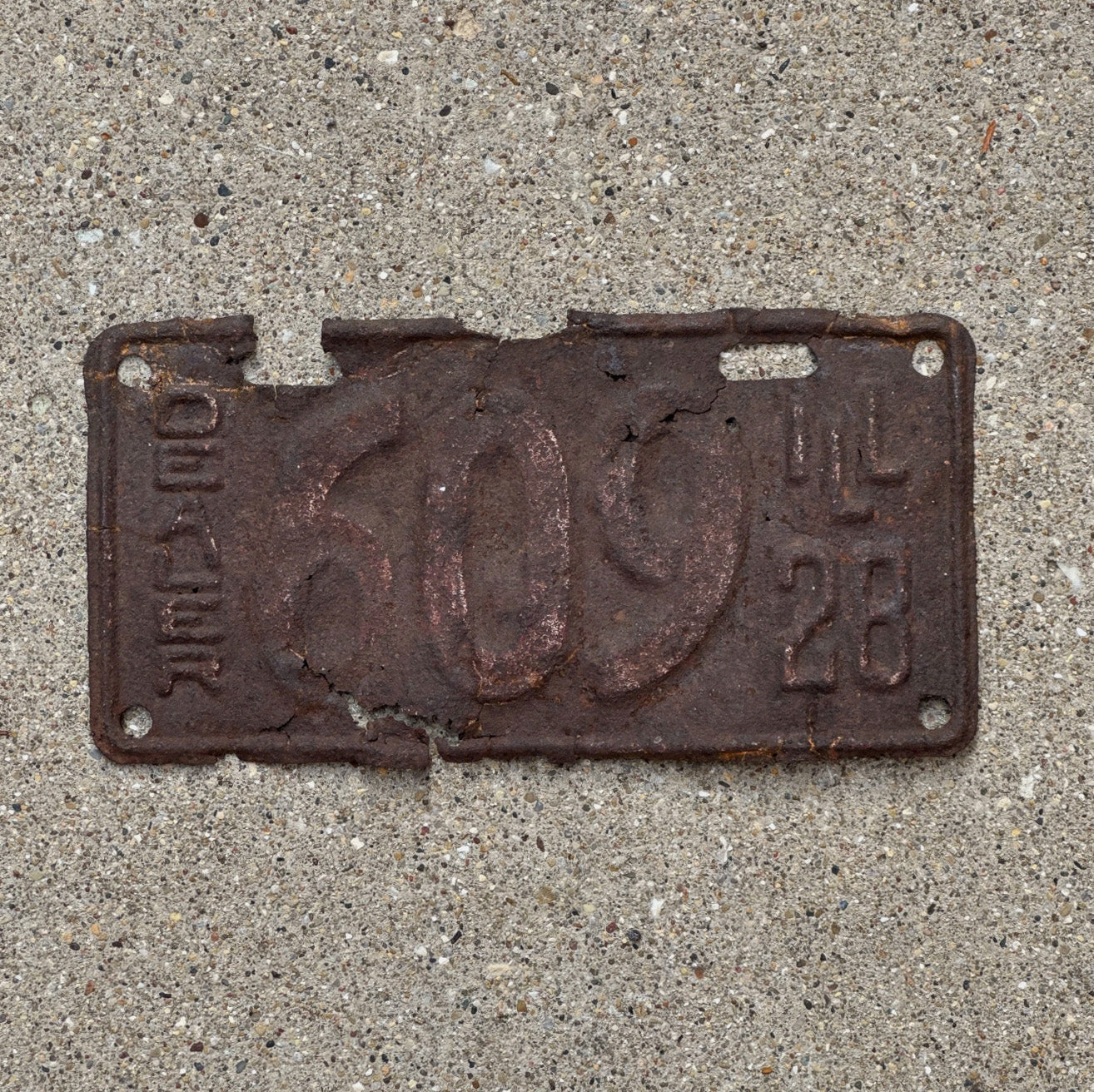 Photo of a 1928 Illinois Dealer License Plate Auto Tag Garage Decor Vintage Low Number Three Digit 609 with original patina