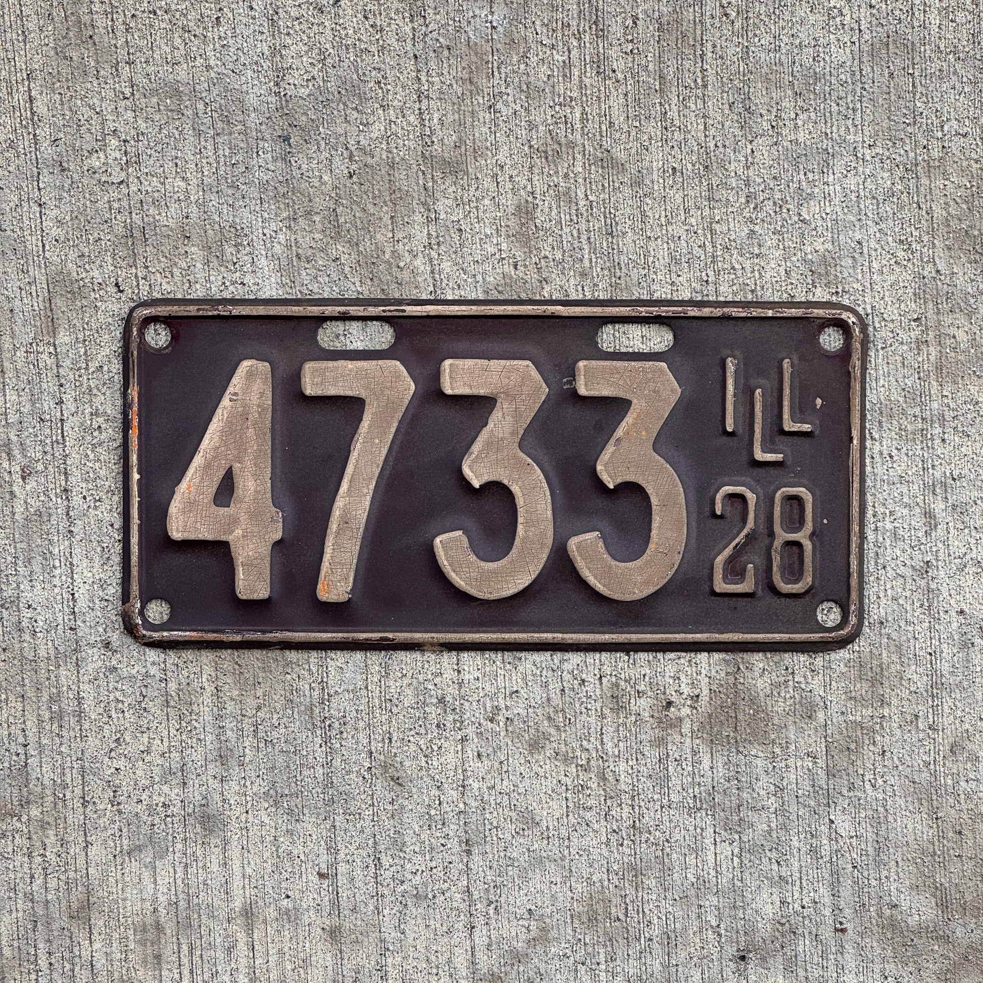 Photo of a 1928 Illinois License Plate Auto Tag Garage Decor Vintage Low Number Four Digit 4733 with original patina