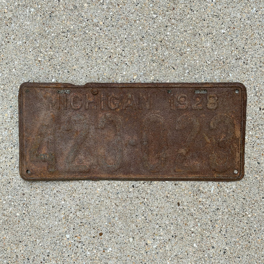 Photo of a 1928 Michigan License Plate Auto Tag Garage Decor Vintage Ford Model A Year 423 023 with original patina