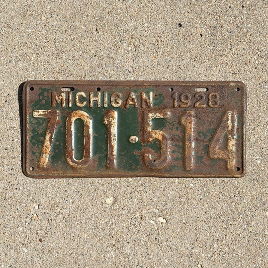 Photo of a 1928 Michigan License Plate Auto Tag Garage Decor Vintage Ford Model A Year 701 514 with original patina