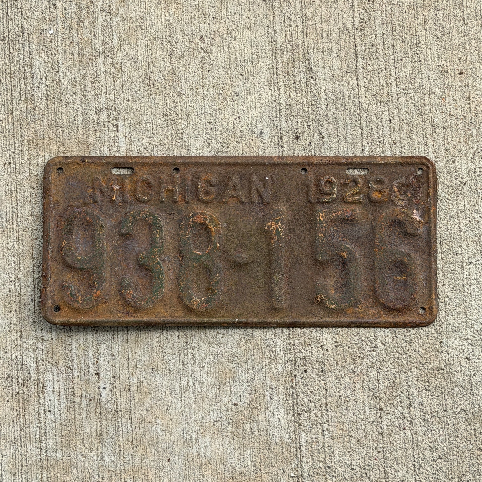 Photo of a 1928 Michigan License Plate Auto Tag Garage Decor Vintage Ford Model A Year 938 156 with original patina