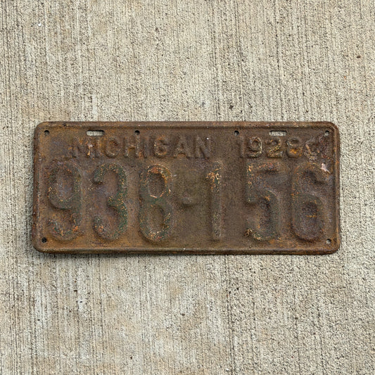 Photo of a 1928 Michigan License Plate Auto Tag Garage Decor Vintage Ford Model A Year 938 156 with original patina