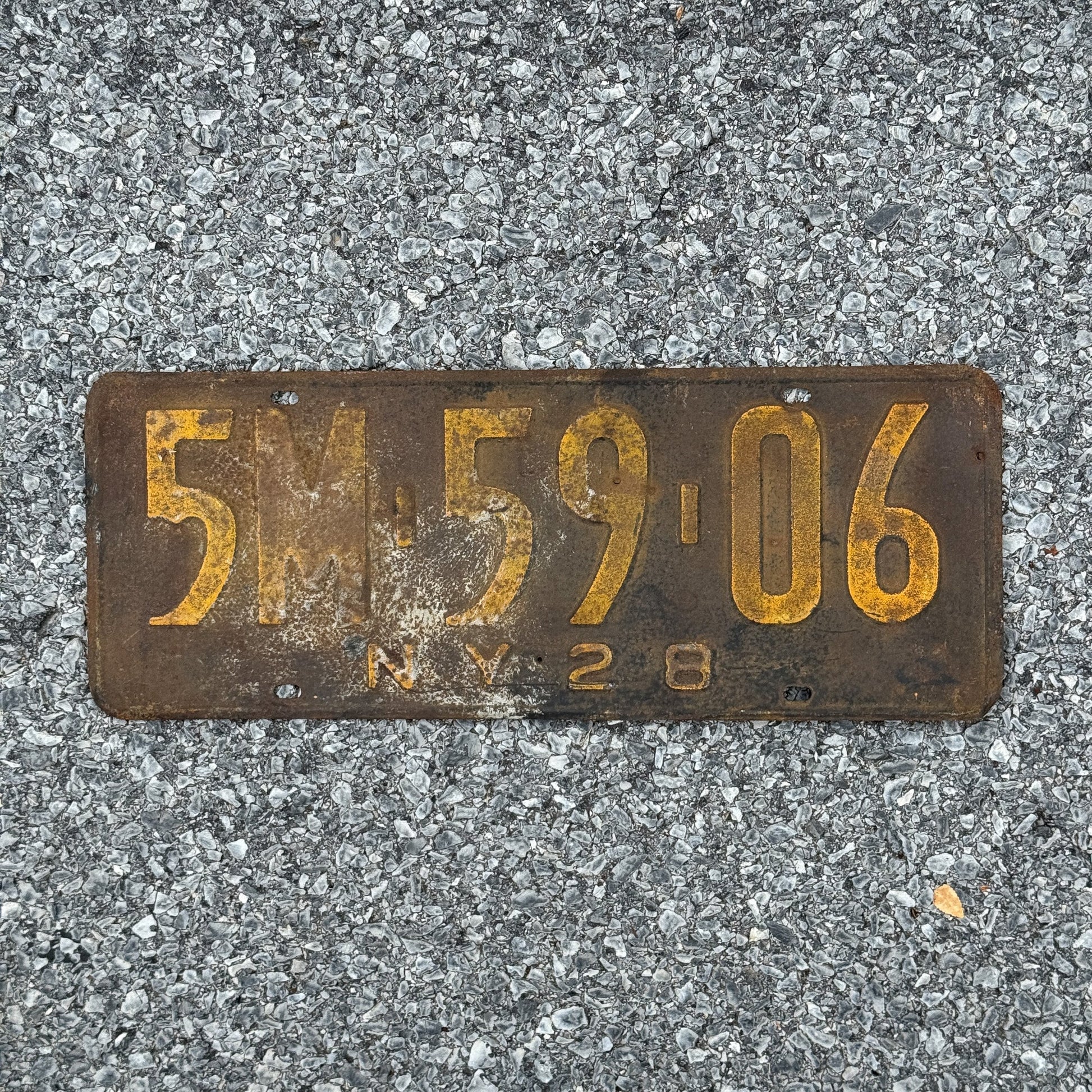 Photo of a 1928 New York License Plate Auto Tag Garage Decor Vintage Ford Model A Year 5M 69 06