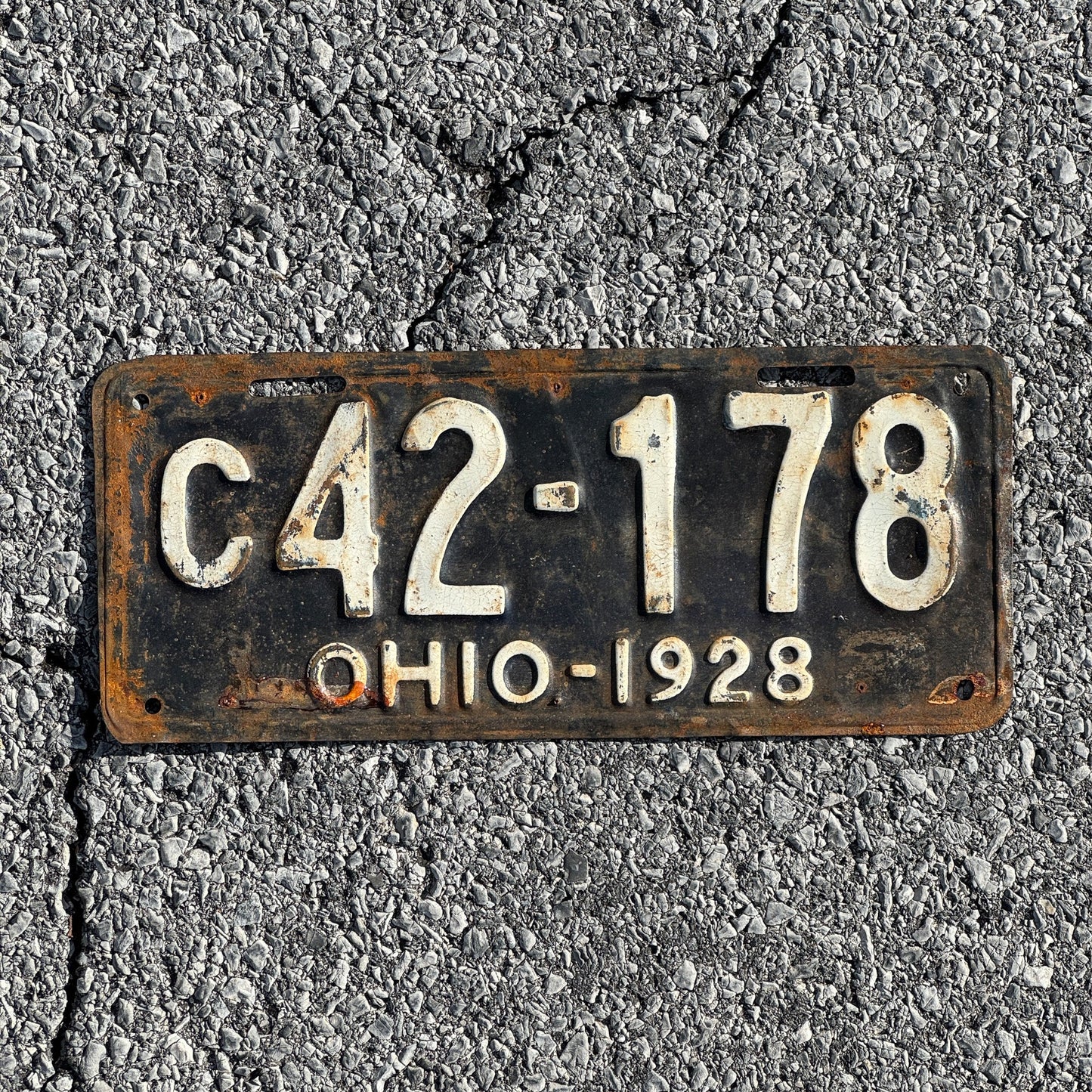 Photo of a 1928 Ohio License Plate Auto Tag Garage Decor Vintage Overflow Series C Prefix C 42 178