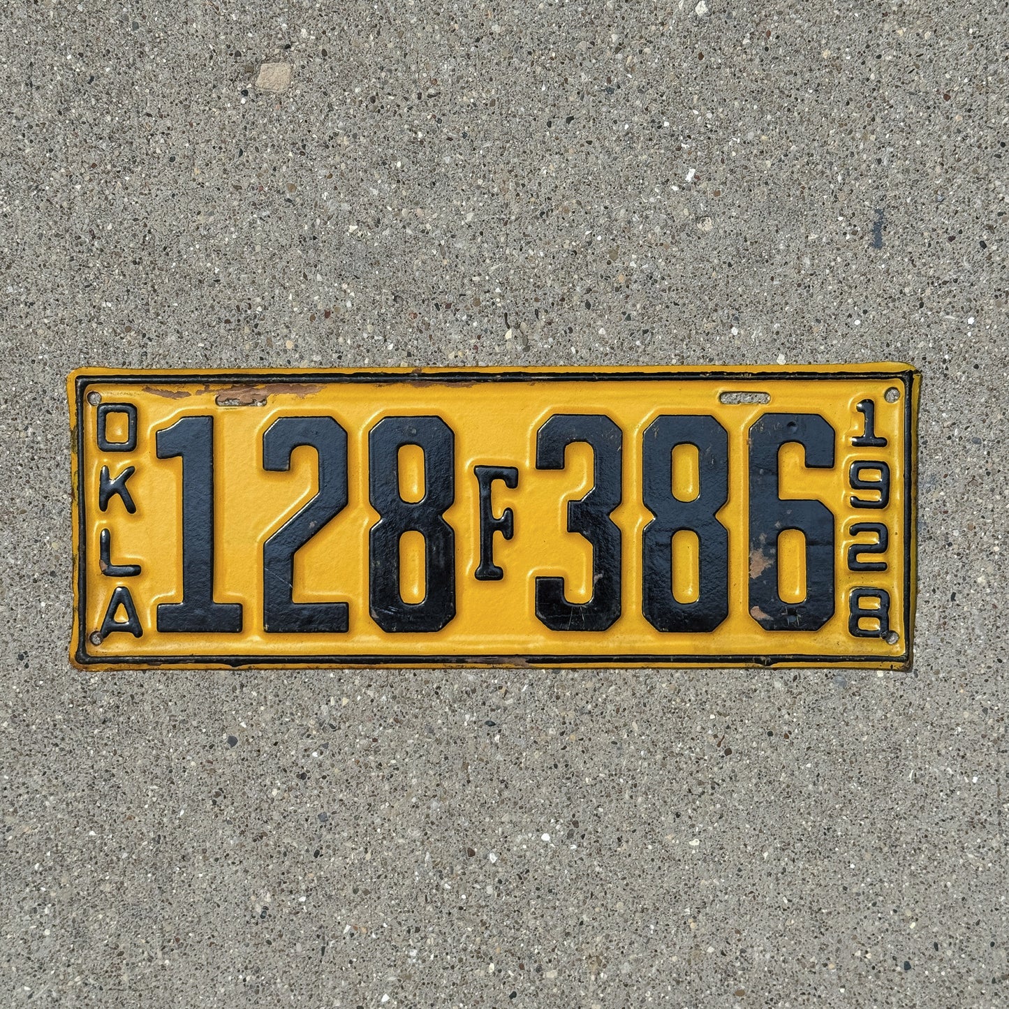 Photo of a 1928 Oklahoma License Plate Auto Tag Garage Decor Vintage Ford Registration 128 F 386 with original patina
