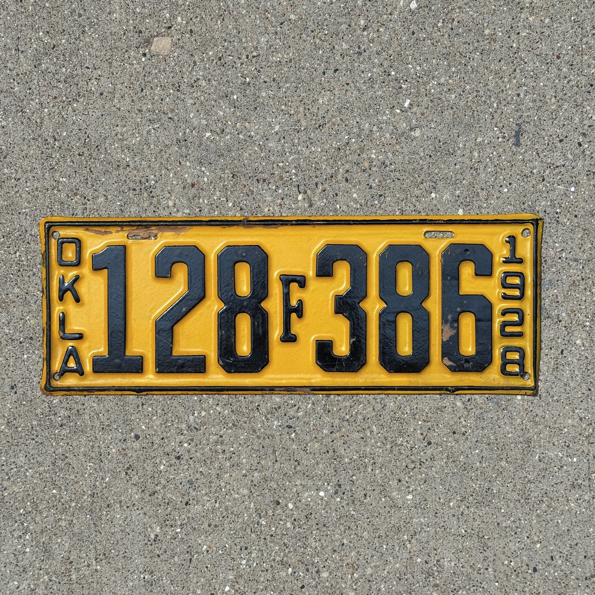 Photo of a 1928 Oklahoma License Plate Auto Tag Garage Decor Vintage Ford Registration 128 F 386 with original patina