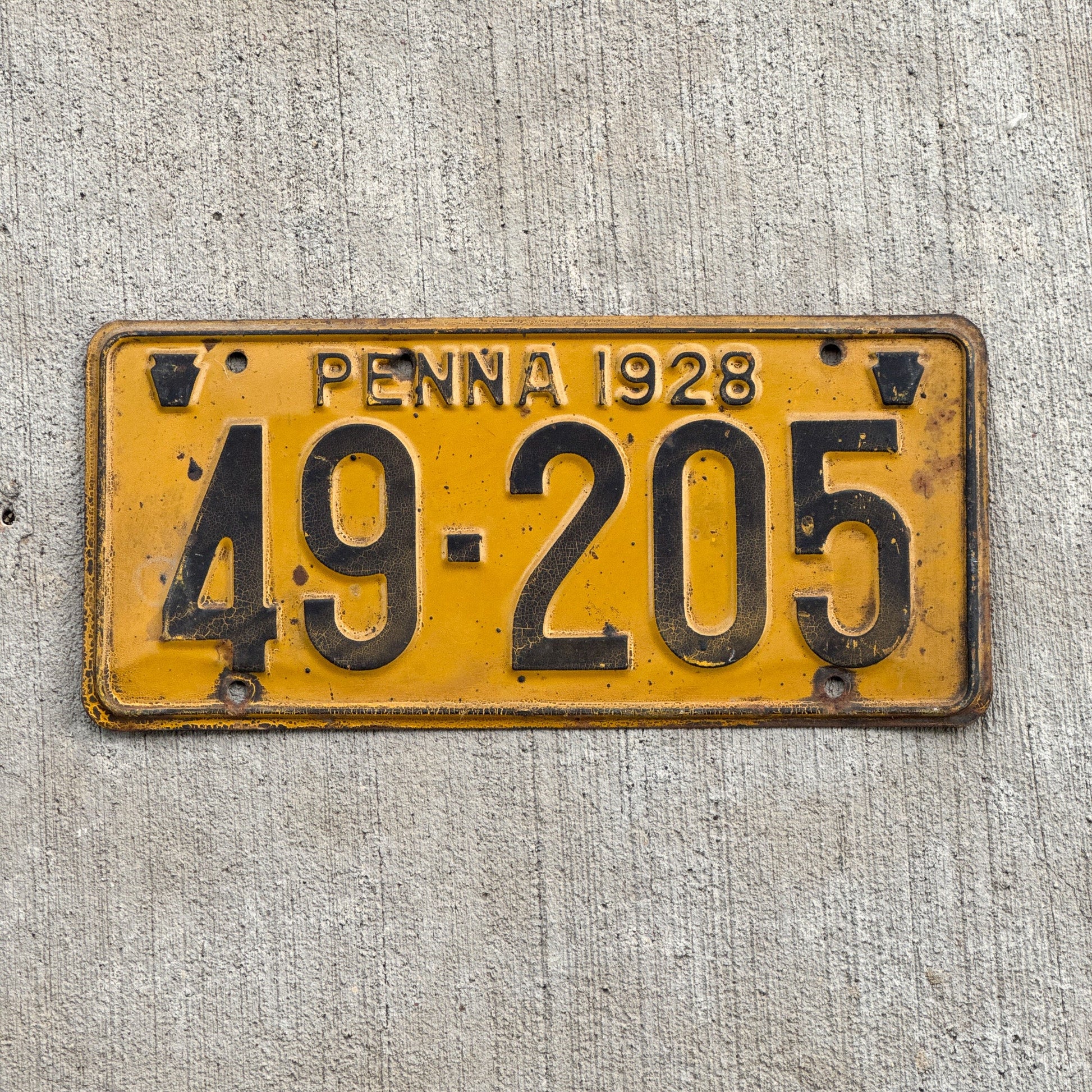 Photo of a 1928 Pennsylvania License Plate Auto Tag Garage Decor Vintage 49 205 with original patina