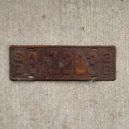 Photo of a 1928 South Dakota License Plate Auto Tag Garage Decor Vintage Ford Model A Year 3 1203 with original patina