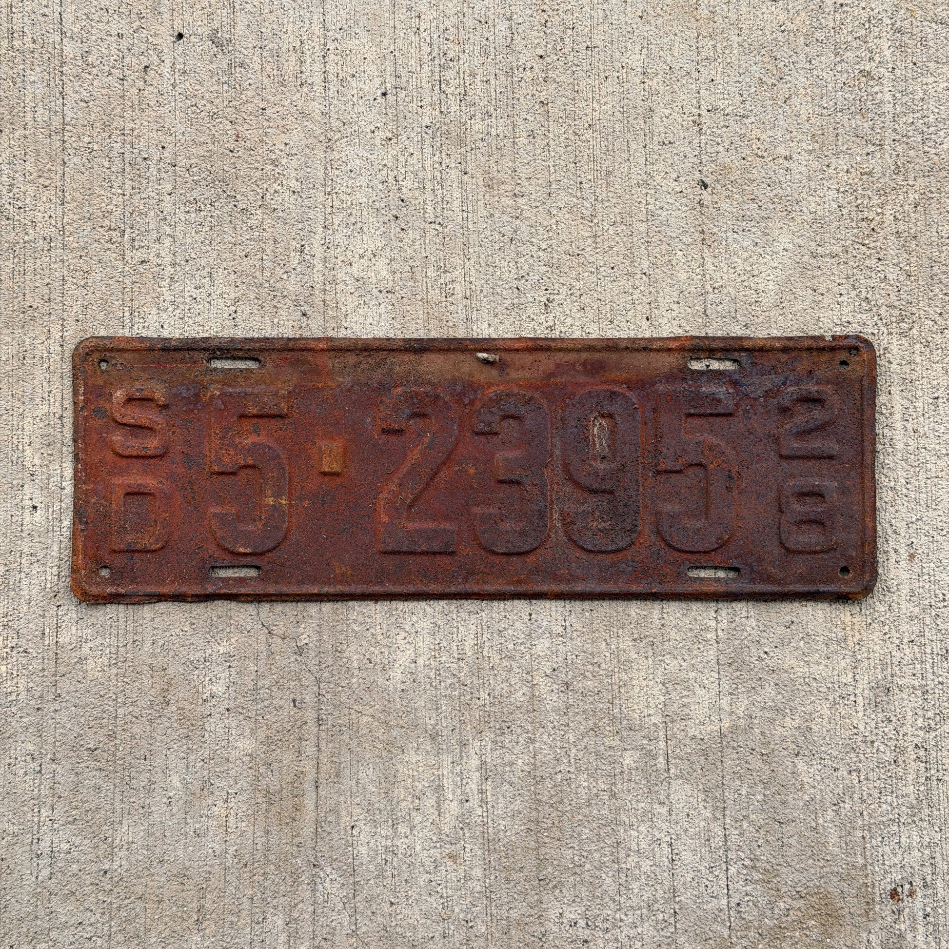 Photo of a 1928 South Dakota License Plate Auto Tag Garage Decor Vintage Ford Model A Year 5 2395 with original patina