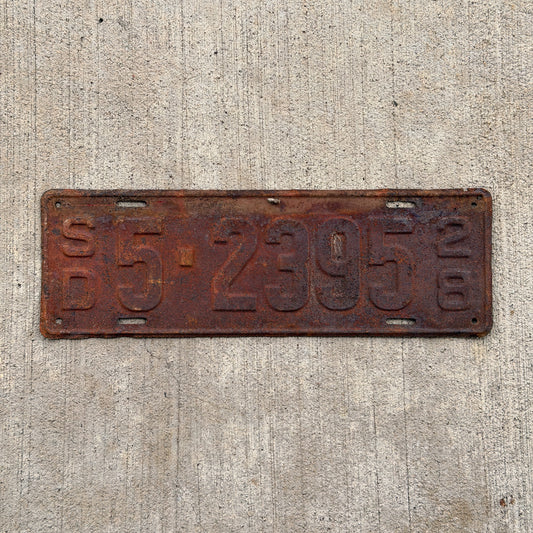 Photo of a 1928 South Dakota License Plate Auto Tag Garage Decor Vintage Ford Model A Year 5 2395 with original patina