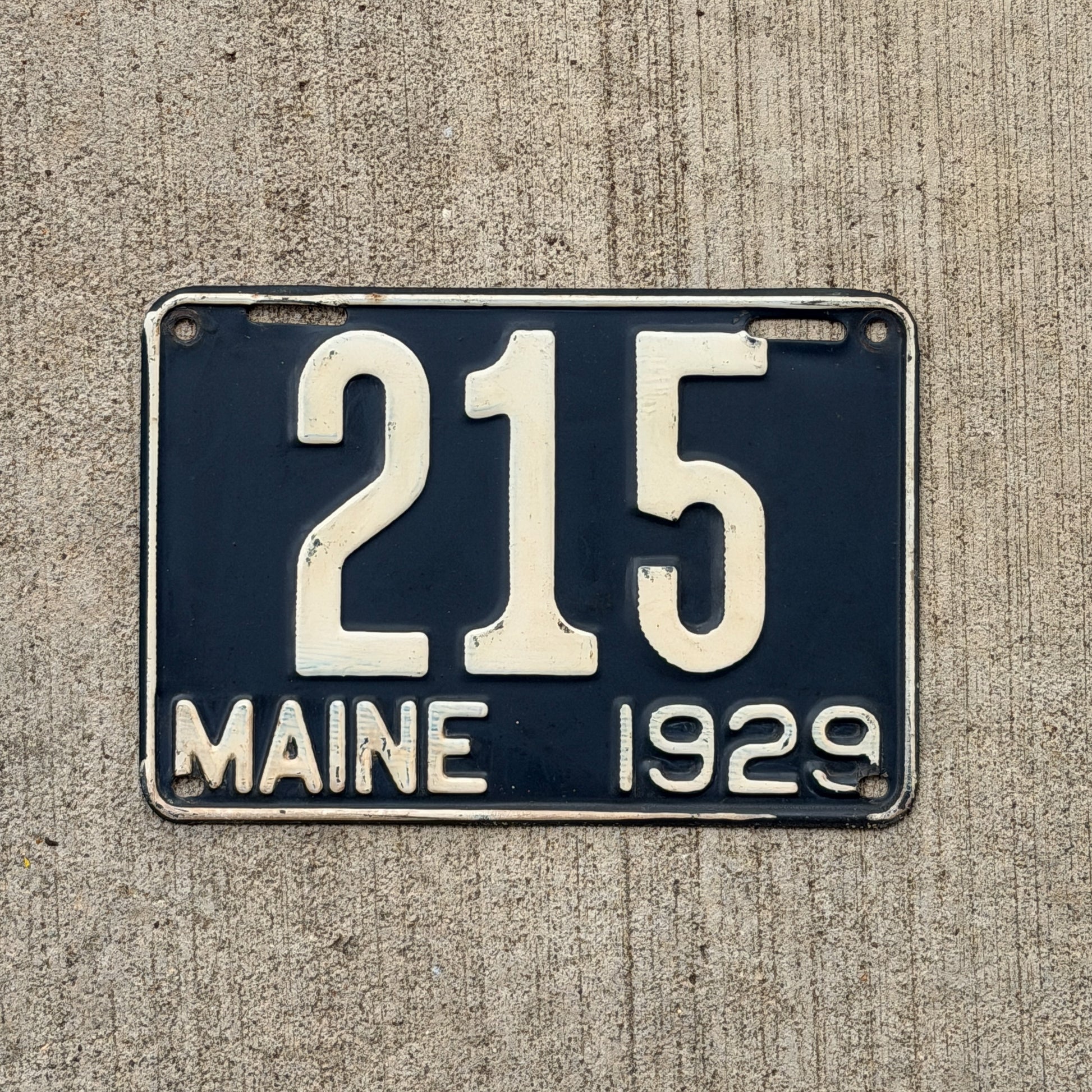 Photo of a 1929 Maine License Plate Auto Tag Garage Decor Vintage Low Number Three Digit 215 with original patina
