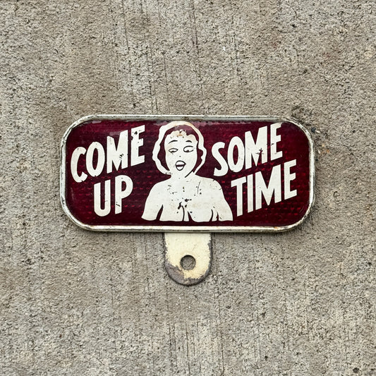 Photo of a 1930 Era Come Up Some Time License Plate Topper Auto Tag Garage Decor Vintage Snow Craggs with original patina