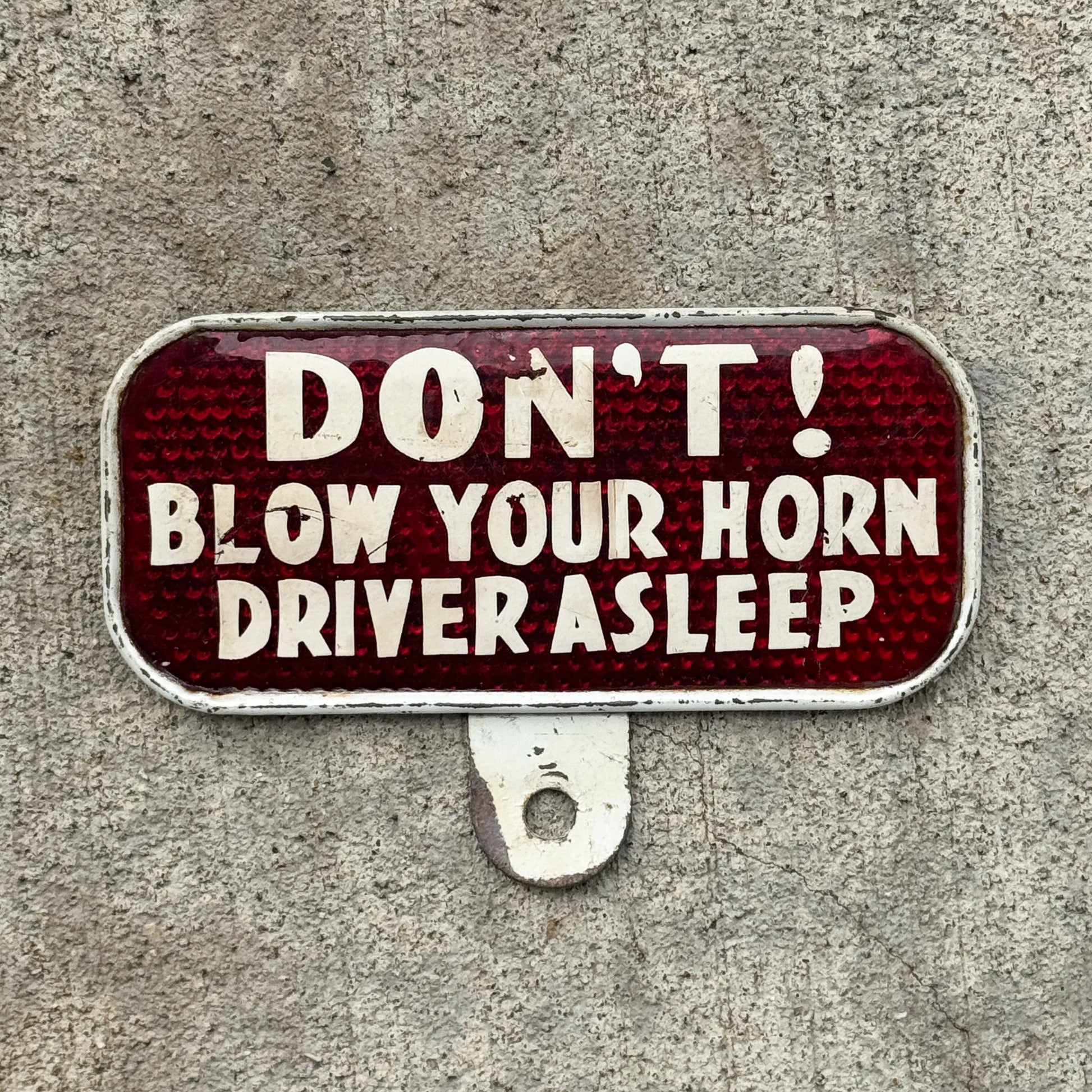 Photo of a 1930 Era Don't Blow Your Horn Driver Asleep License Plate Topper Auto Tag Garage Decor Vintage Snow Craggs with original patina