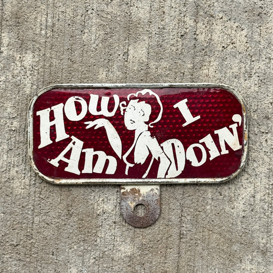 Photo of a 1930 Era How Am I Doin' License Plate Topper Auto Tag Garage Decor Vintage Snow Craggs with original patina