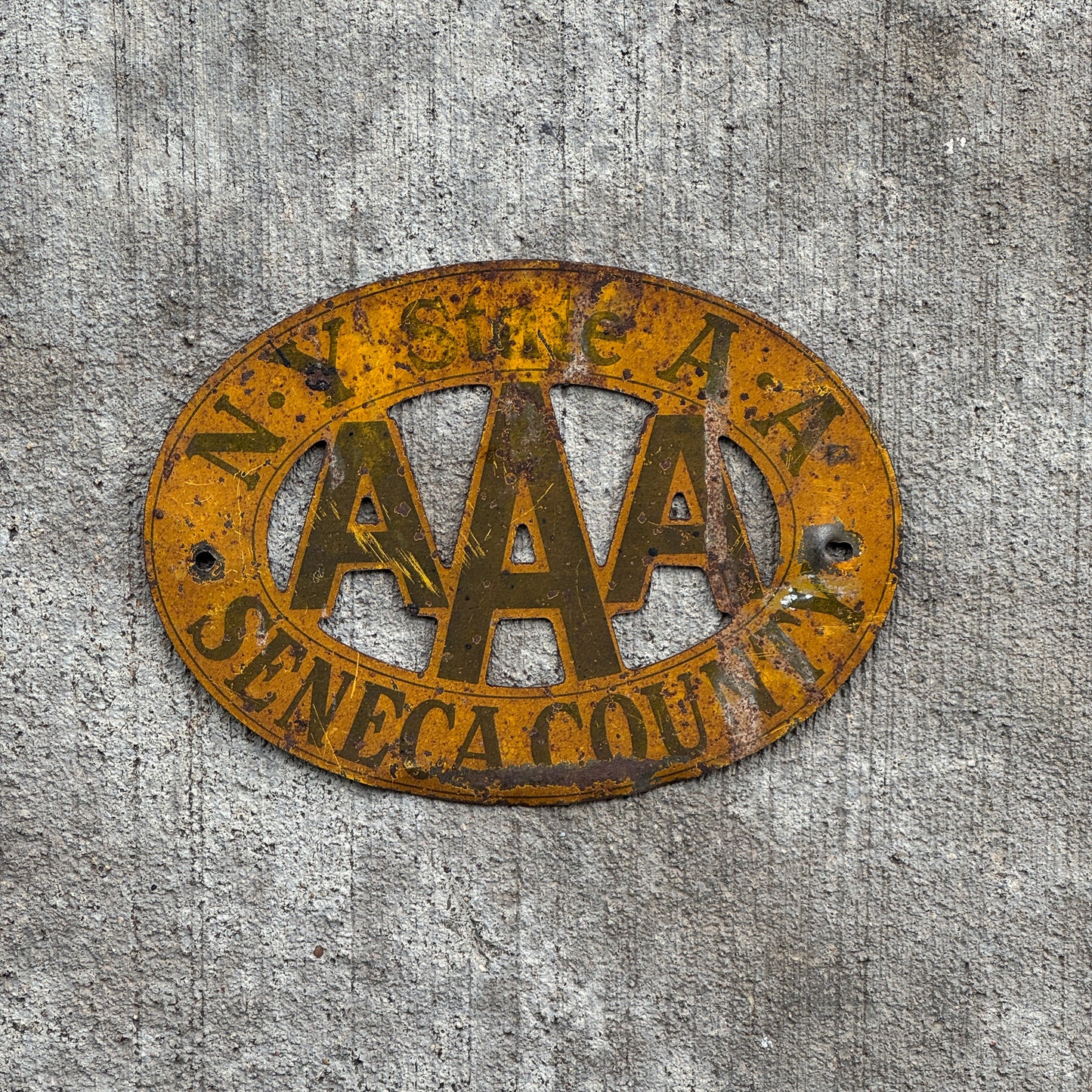 Photo of a 1930 Era Seneca County New York Badge Emblem License Plate Topper Auto Tag Garage Decor Vintage AAA with original patina