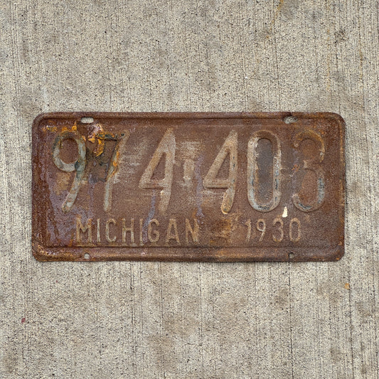 Photo of a 1930 Michigan License Plate Auto Tag Garage Decor Vintage Ford Model A Year 974 403 with original patina