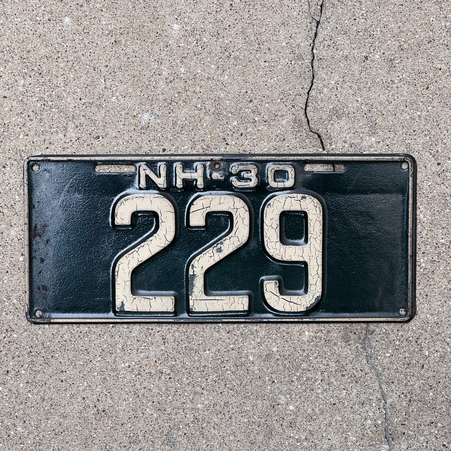 Photo of a 1930 New Hampshire License Plate Auto Tag Garage Decor Vintage Low Number Three Digit 229 with original patina