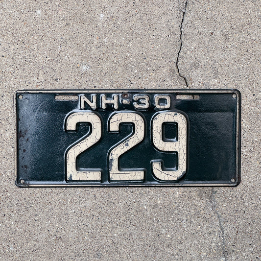 Photo of a 1930 New Hampshire License Plate Auto Tag Garage Decor Vintage Low Number Three Digit 229 with original patina