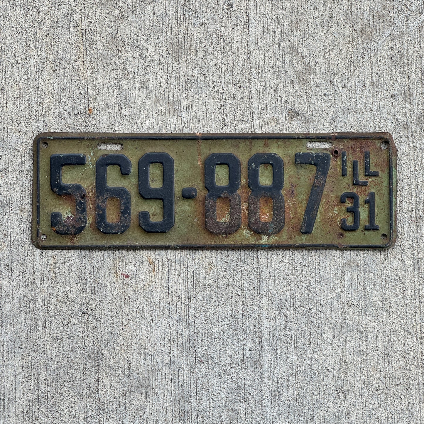 Photo of a 1931 Illinois License Plate Auto Tag Garage Decor Vintage Ford Model A Year 569 887 with original patina