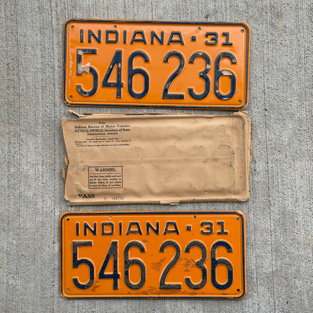 Photo of a 1931 Indiana License Plate Pair Auto Tag Garage Decor Vintage Ford Model A Year NOS with Envelope 546 236 with original patina