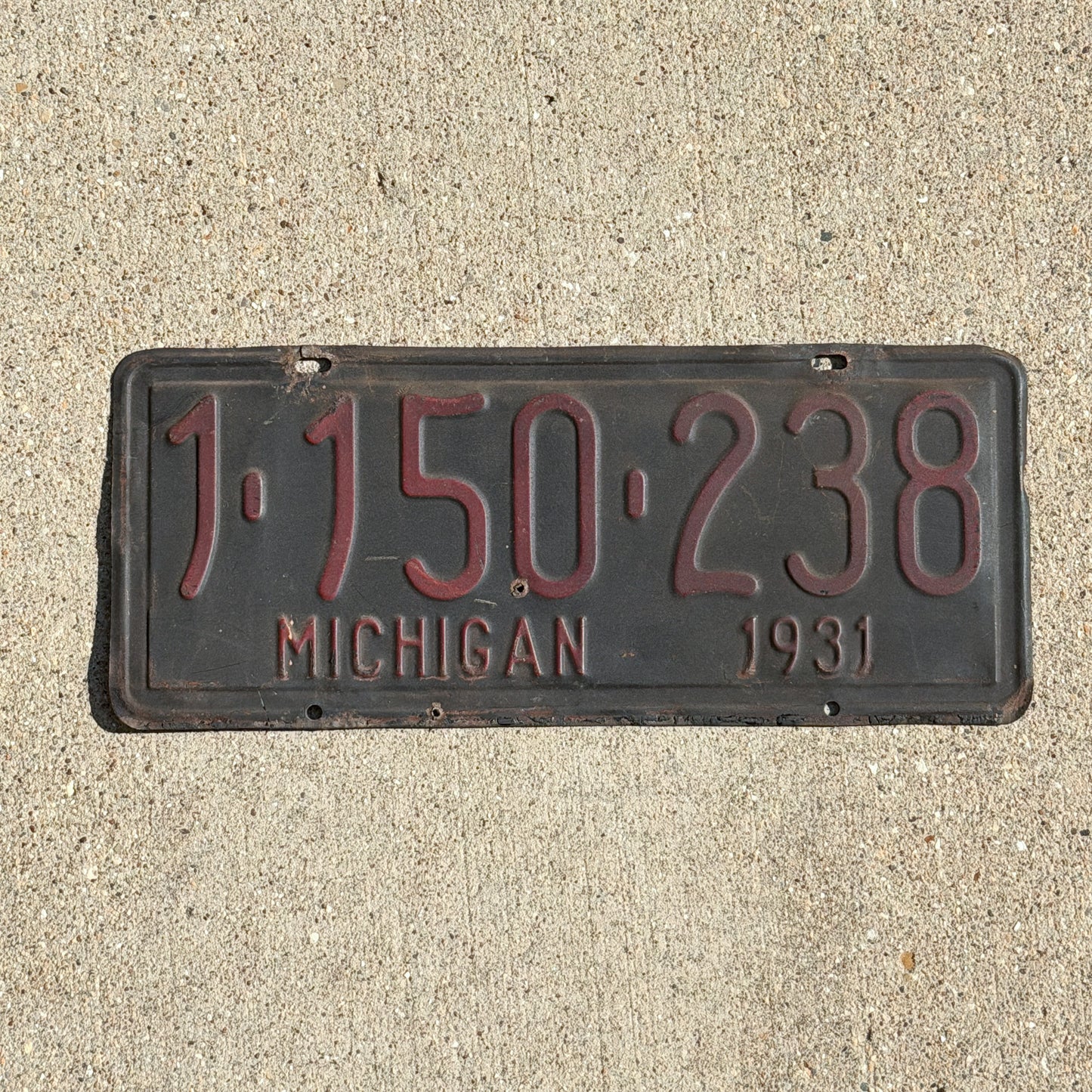 Photo of a 1931 Michigan License Plate Auto Tag Garage Decor Vintage Ford Model A Year 1 150 238 with original patina