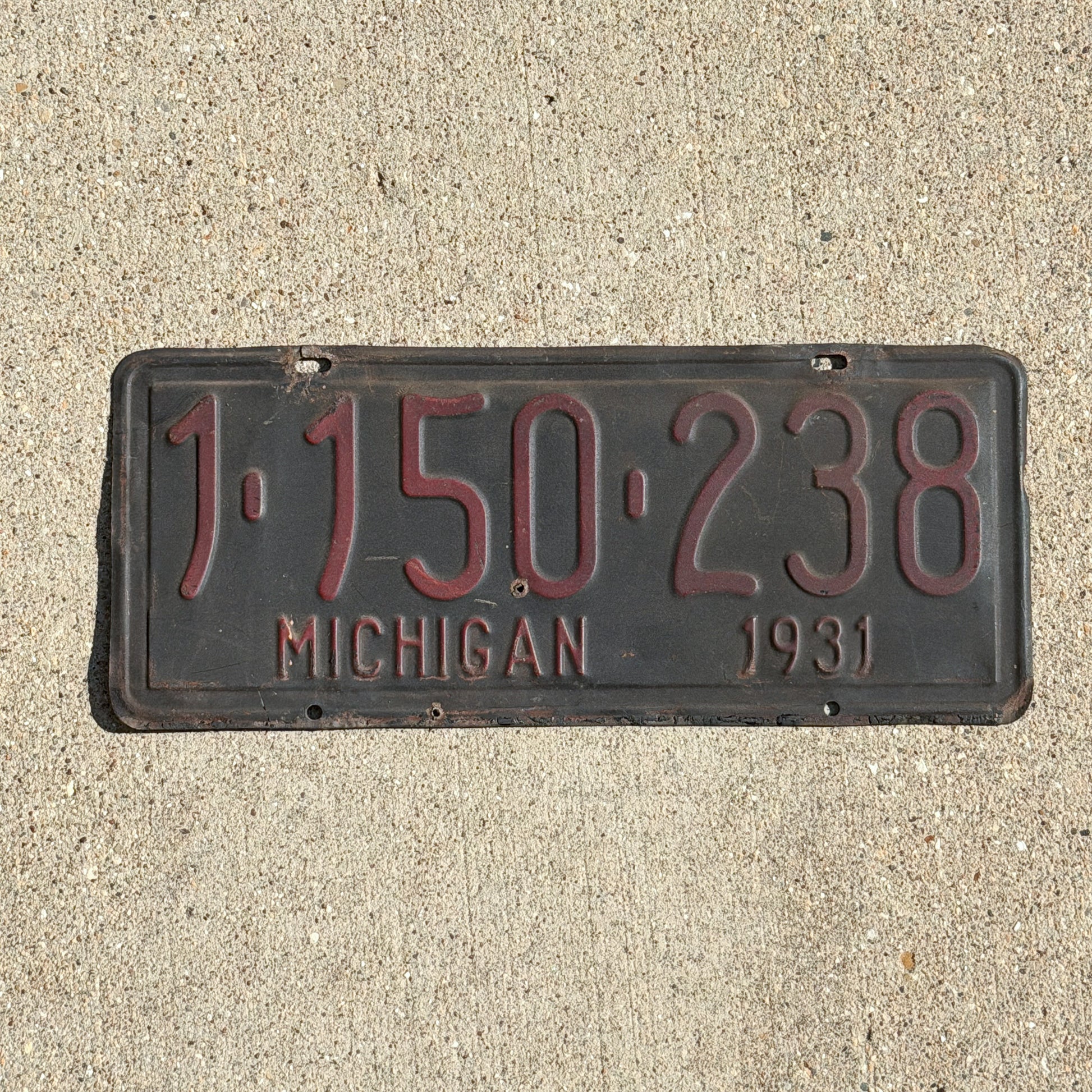 Photo of a 1931 Michigan License Plate Auto Tag Garage Decor Vintage Ford Model A Year 1 150 238 with original patina