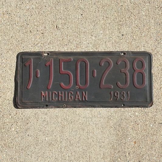 Photo of a 1931 Michigan License Plate Auto Tag Garage Decor Vintage Ford Model A Year 1 150 238 with original patina