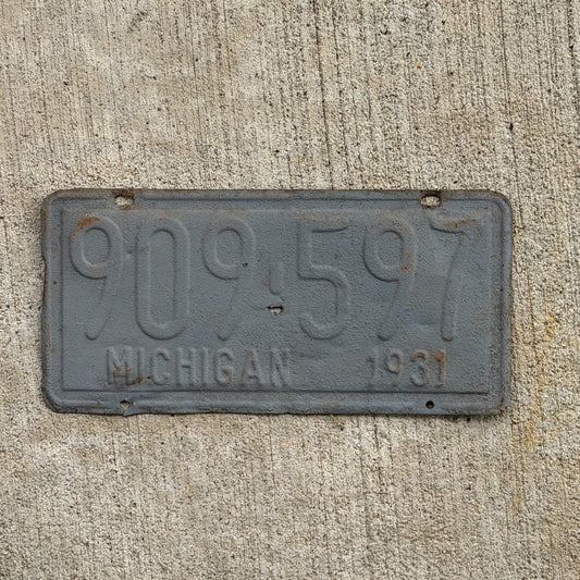 Photo of a 1931 Michigan License Plate Auto Tag Garage Decor Vintage Ford Model A Year 909 597 with original patina