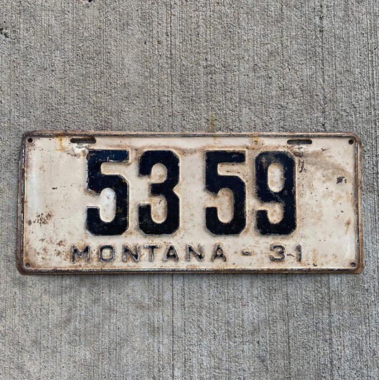 Photo of a 1931 Montana License Plate Auto Tag Garage Decor Vintage Ford Model A Year Low Number Four Digit 5359 with original patina