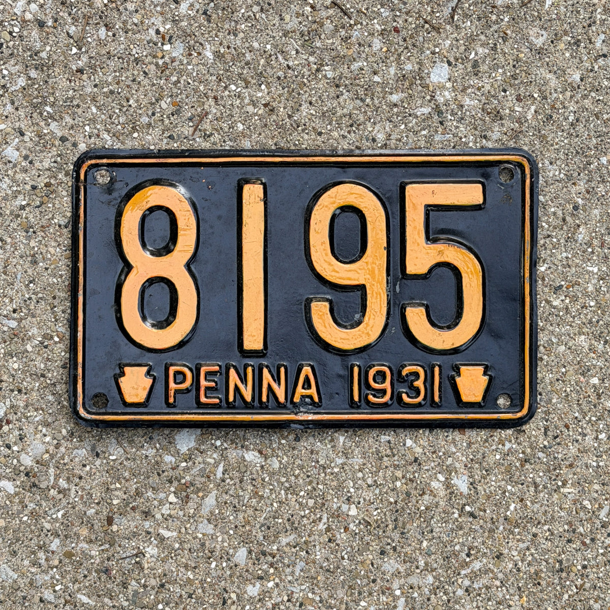 Photo of a 1931 Pennsylvania License Plate Auto Tag Garage Decor Vintage Low Number Four Digit 8195 with original patina