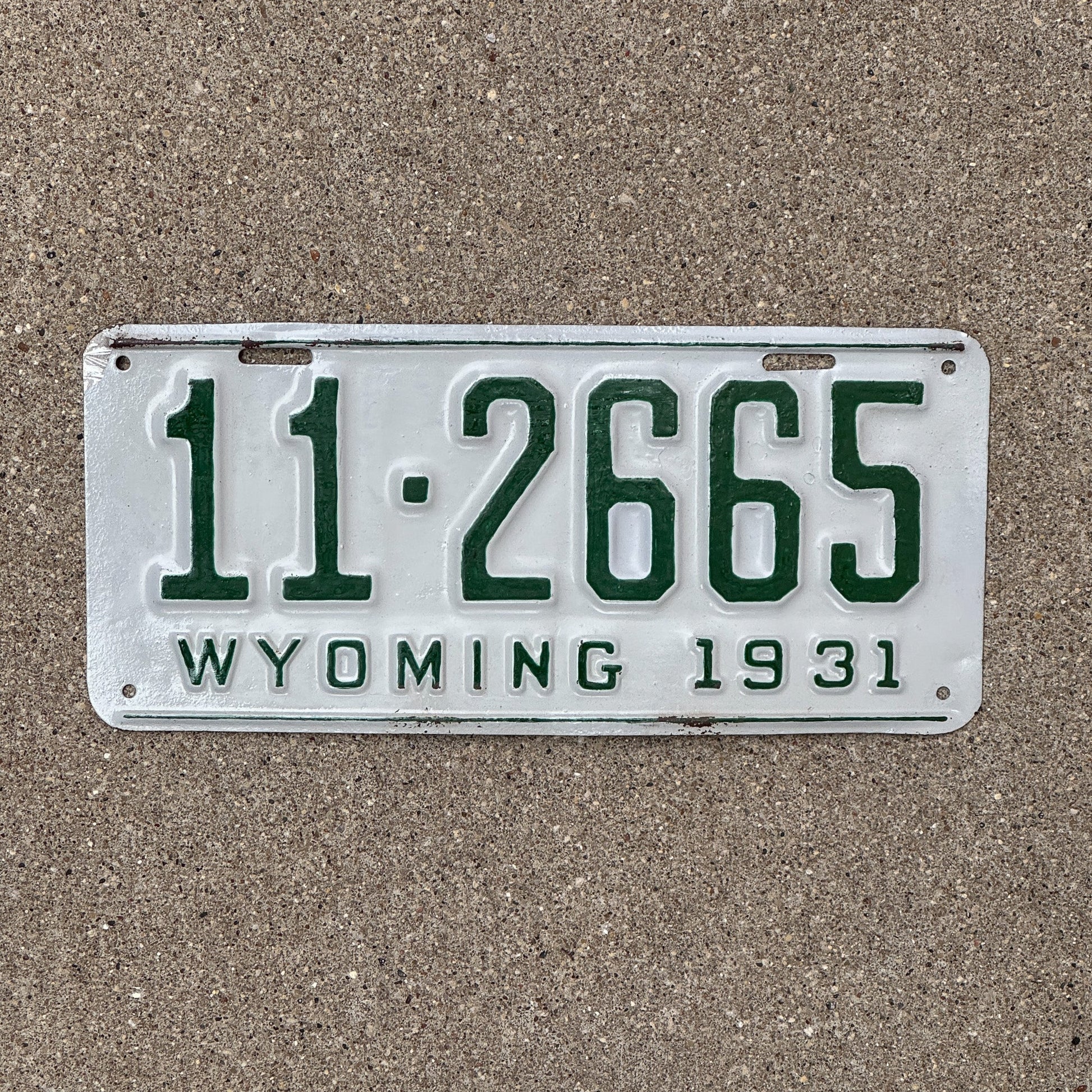 Photo of a 1931 Wyoming License Plate Auto Tag Garage Decor Vintage 11 2665 with original patina