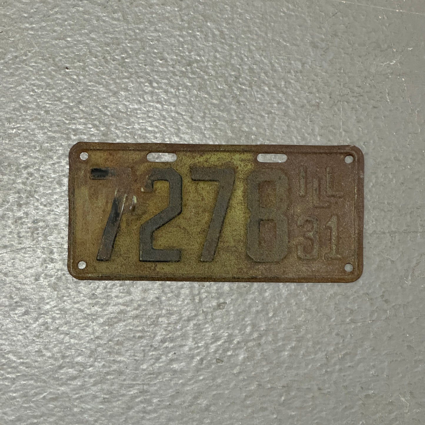 Photo of a 1931 Illinois License Plate Auto Tag Low Number Four Digit 7278 on a gray background